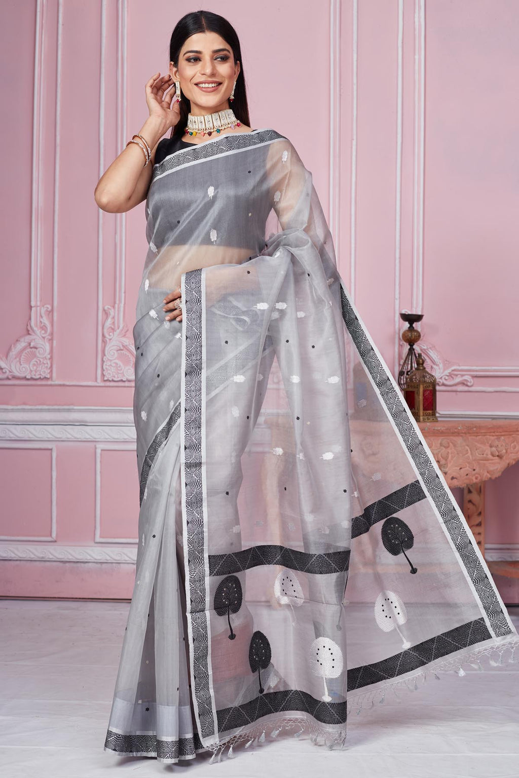 Buy beautiful light grey Banarasi saree online in USA with scattered buti. Look your best on festive occasions in latest designer saris, pure silk sarees, Kanjivaram silk sarees, handwoven saris, tussar silk sarees, embroidered saris from Pure Elegance Indian fashion store in USA.-full view