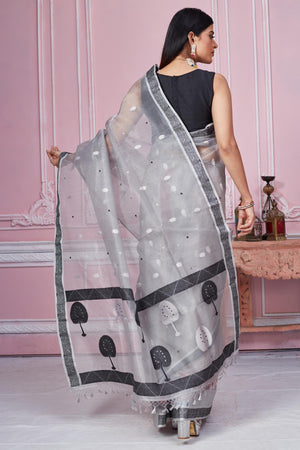 Buy beautiful light grey Banarasi saree online in USA with scattered buti. Look your best on festive occasions in latest designer saris, pure silk sarees, Kanjivaram silk sarees, handwoven saris, tussar silk sarees, embroidered saris from Pure Elegance Indian fashion store in USA.-back