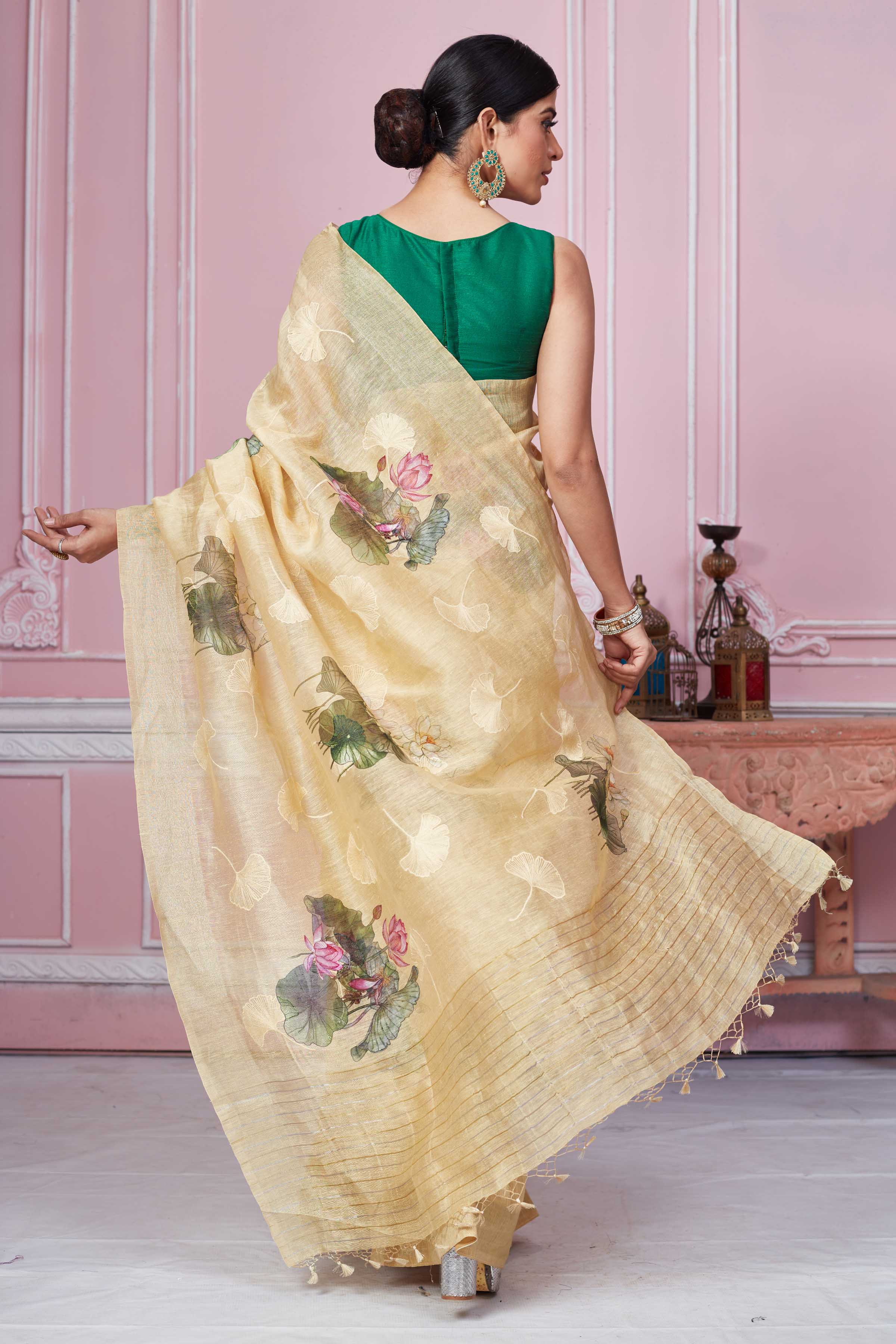 Shop stunning cream floral print Banarasi saree online in USA. Look your best on festive occasions in latest designer sarees, pure silk saris, Kanchipuram silk sarees, handwoven sarees, tussar silk saris, embroidered sarees from Pure Elegance Indian fashion store in USA.-back
