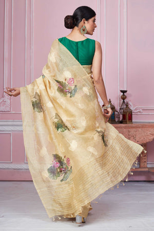 Shop stunning cream floral print Banarasi saree online in USA. Look your best on festive occasions in latest designer sarees, pure silk saris, Kanchipuram silk sarees, handwoven sarees, tussar silk saris, embroidered sarees from Pure Elegance Indian fashion store in USA.-back