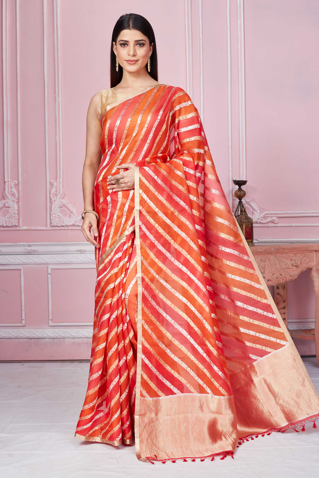 Shop red orange zari stripes Banarasi saree online in USA. Look your best on festive occasions in latest designer sarees, pure silk saris, Kanchipuram silk sarees, handwoven sarees, tussar silk saris, embroidered sarees from Pure Elegance Indian fashion store in USA.-full view