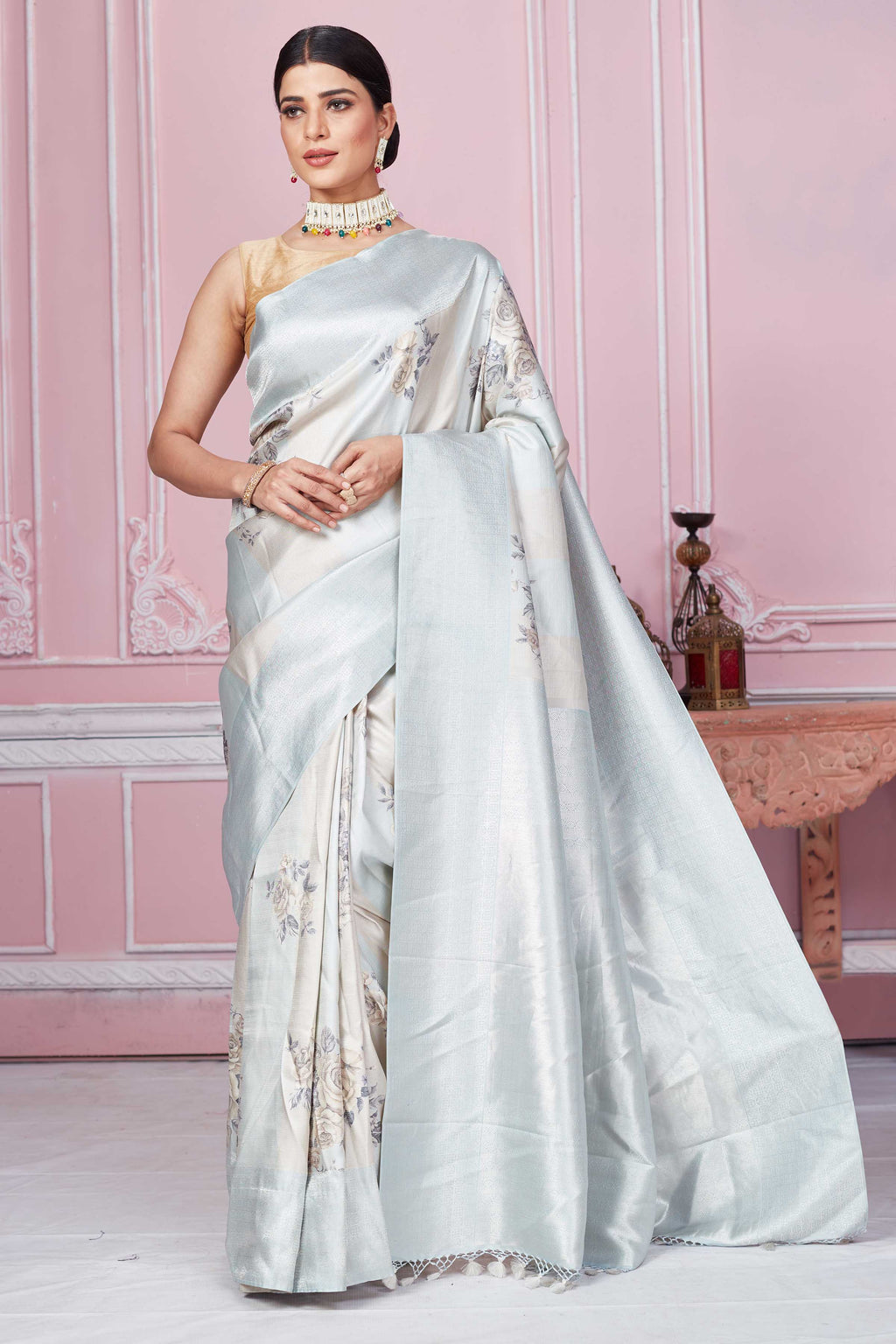 Shop powder blue floral Banarasi saree online in USA with zari border. Look your best on festive occasions in latest designer sarees, pure silk saris, Kanchipuram silk sarees, handwoven sarees, tussar silk saris, embroidered sarees from Pure Elegance Indian fashion store in USA.-full view