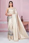 Buy beige floral Banarasi saree online in USA with zari border. Look your best on festive occasions in latest designer sarees, pure silk saris, Kanchipuram silk sarees, handwoven sarees, tussar silk saris, embroidered sarees from Pure Elegance Indian fashion store in USA.-full view