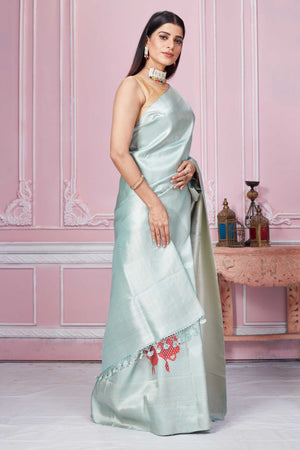 Shop sage green Banarasi saree online in USA with red floral design. Look your best on festive occasions in latest designer sarees, pure silk saris, Kanchipuram silk sarees, handwoven sarees, tussar silk saris, embroidered sarees from Pure Elegance Indian fashion store in USA.-side