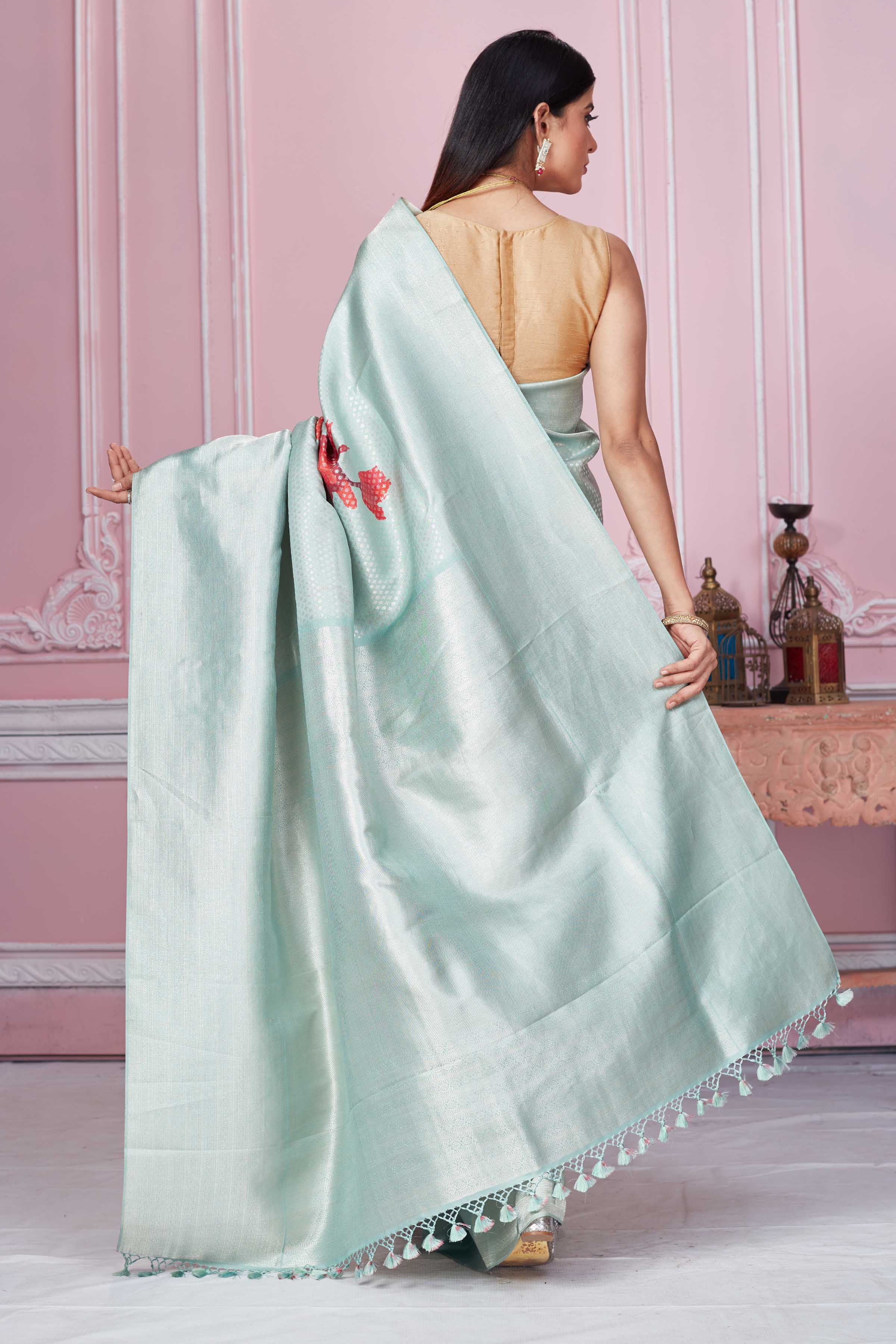 Shop sage green Banarasi saree online in USA with red floral design. Look your best on festive occasions in latest designer sarees, pure silk saris, Kanchipuram silk sarees, handwoven sarees, tussar silk saris, embroidered sarees from Pure Elegance Indian fashion store in USA.-back