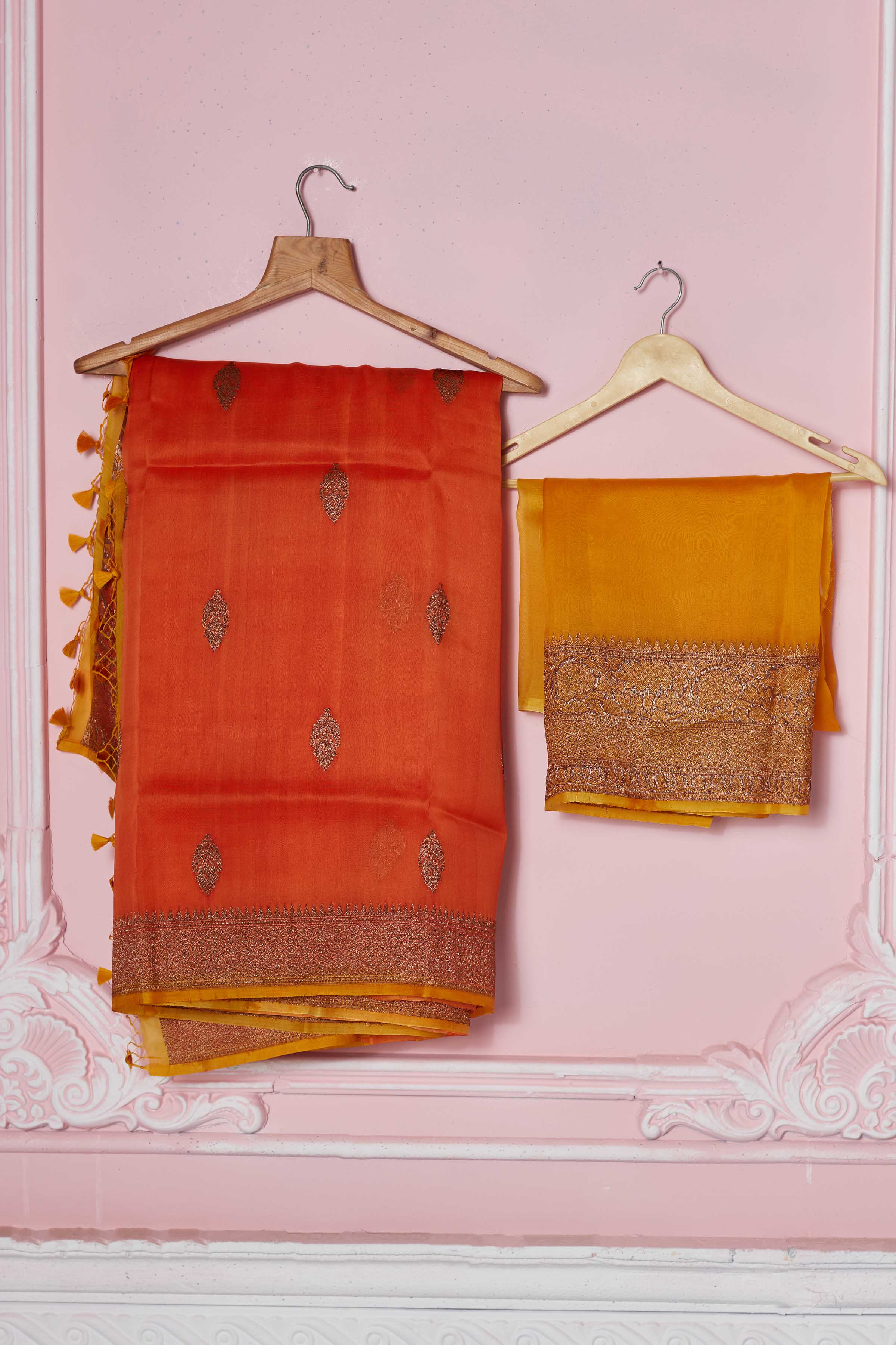 Shop orange Banarasi saree online in USA with red zari border. Look your best on festive occasions in latest designer sarees, pure silk saris, Kanchipuram silk sarees, handwoven sarees, tussar silk saris, embroidered sarees from Pure Elegance Indian fashion store in USA.-blouse