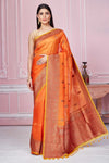 Shop orange Banarasi saree online in USA with red zari border. Look your best on festive occasions in latest designer sarees, pure silk saris, Kanchipuram silk sarees, handwoven sarees, tussar silk saris, embroidered sarees from Pure Elegance Indian fashion store in USA.-full view