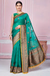 Buy green Banarasi saree online in USA with antique zari border. Look your best on festive occasions in latest designer sarees, pure silk saris, Kanchipuram silk sarees, handwoven sarees, tussar silk saris, embroidered sarees from Pure Elegance Indian fashion store in USA.-full view