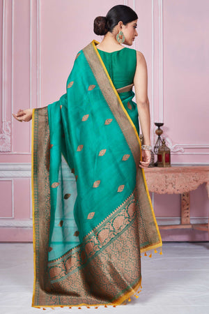 Buy green Banarasi saree online in USA with antique zari border. Look your best on festive occasions in latest designer sarees, pure silk saris, Kanchipuram silk sarees, handwoven sarees, tussar silk saris, embroidered sarees from Pure Elegance Indian fashion store in USA.-back