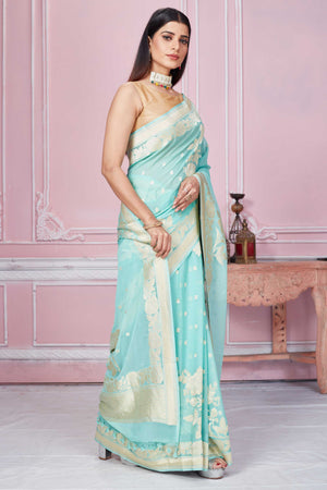 Buy mint green Banarasi sari online in USA with floral zari work. Look your best on festive occasions in latest designer sarees, pure silk saris, Kanchipuram silk sarees, handwoven sarees, tussar silk saris, embroidered sarees from Pure Elegance Indian fashion store in USA.-side