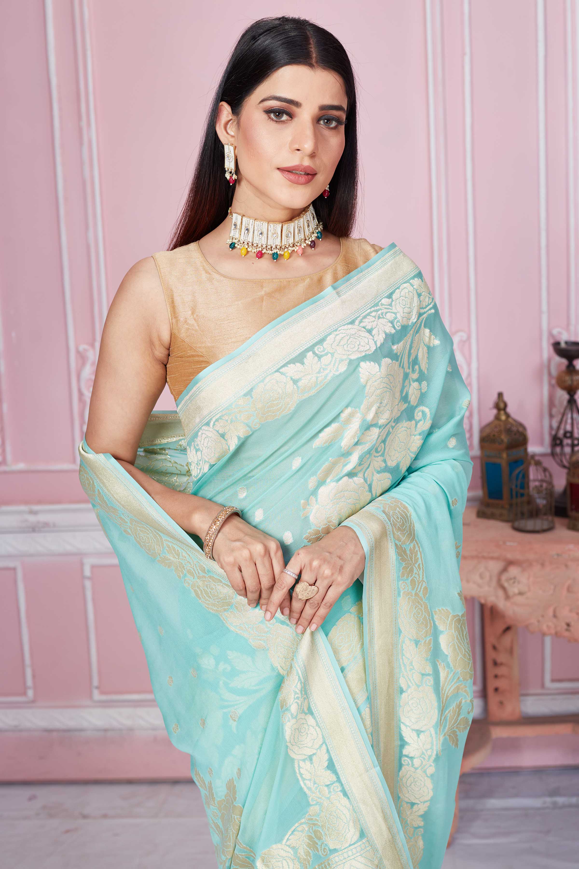 Buy mint green Banarasi sari online in USA with floral zari work. Look your best on festive occasions in latest designer sarees, pure silk saris, Kanchipuram silk sarees, handwoven sarees, tussar silk saris, embroidered sarees from Pure Elegance Indian fashion store in USA.-closeup