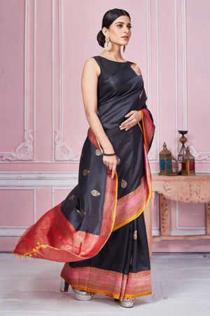 Shop black Banarasi sari online in USA with pink zari border. Look your best on festive occasions in latest designer sarees, pure silk saris, Kanchipuram silk sarees, handwoven sarees, tussar silk saris, embroidered sarees from Pure Elegance Indian fashion store in USA.-side