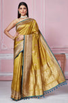 Buy golden Banarasi sari online in USA with zari minakari buta. Look your best on festive occasions in latest designer sarees, pure silk saris, Kanchipuram silk sarees, handwoven sarees, tussar silk saris, embroidered sarees from Pure Elegance Indian fashion store in USA.-full view