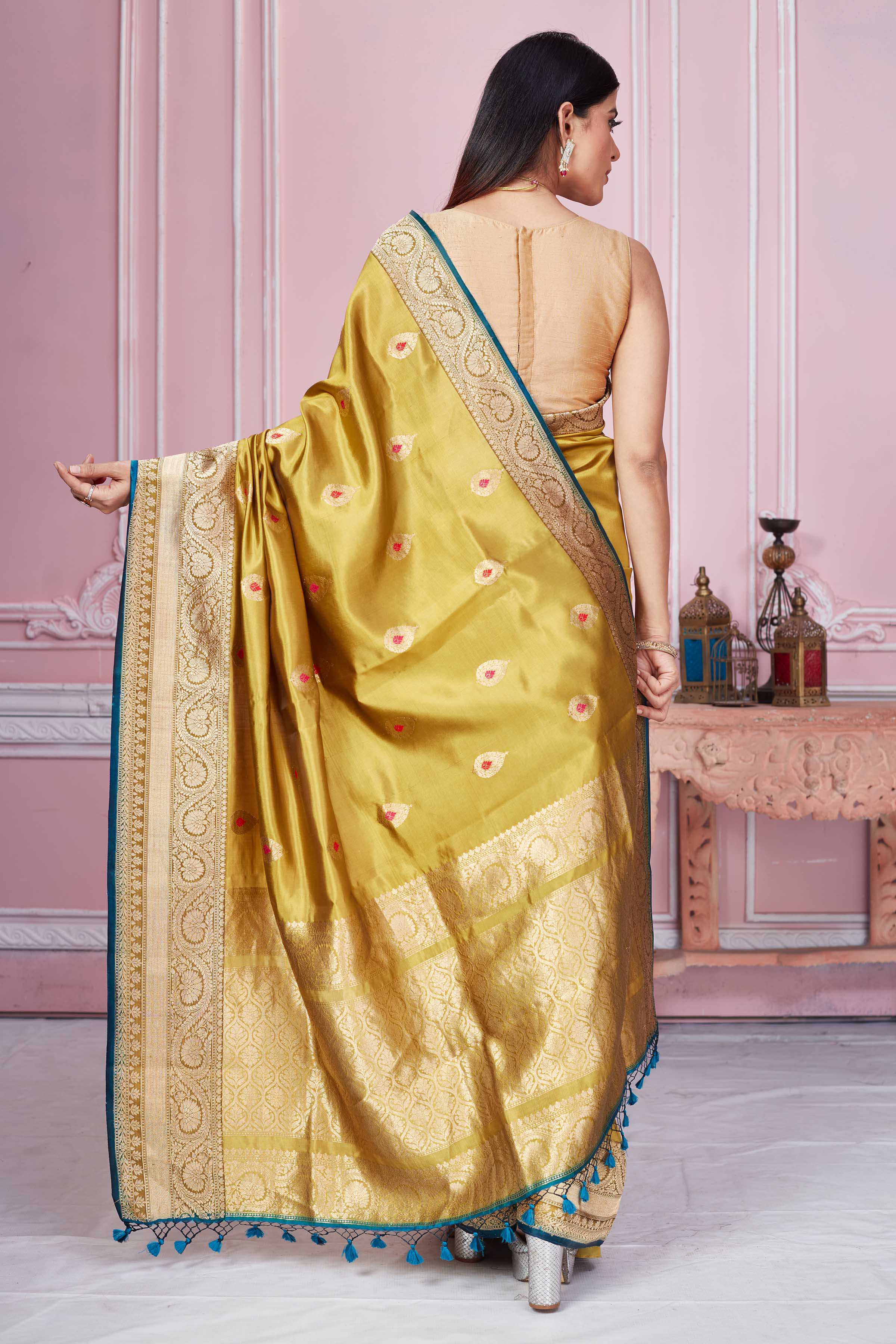 Buy golden Banarasi sari online in USA with zari minakari buta. Look your best on festive occasions in latest designer sarees, pure silk saris, Kanchipuram silk sarees, handwoven sarees, tussar silk saris, embroidered sarees from Pure Elegance Indian fashion store in USA.-back