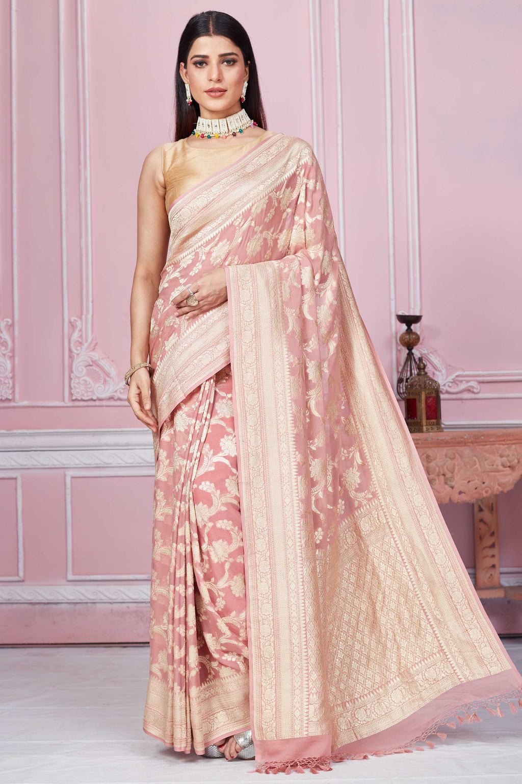 Buy dusty pink Banarasi sari online in USA with floral zari jaal. Look your best on festive occasions in latest designer sarees, pure silk saris, Kanchipuram silk sarees, handwoven sarees, tussar silk saris, embroidered sarees from Pure Elegance Indian fashion store in USA.-full view
