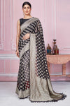 Shop black Banarasi sari online in USA with silver zari buta and border. Look your best on festive occasions in latest designer sarees, pure silk saris, Kanchipuram silk sarees, handwoven sarees, tussar silk saris, embroidered sarees from Pure Elegance Indian fashion store in USA.-full view