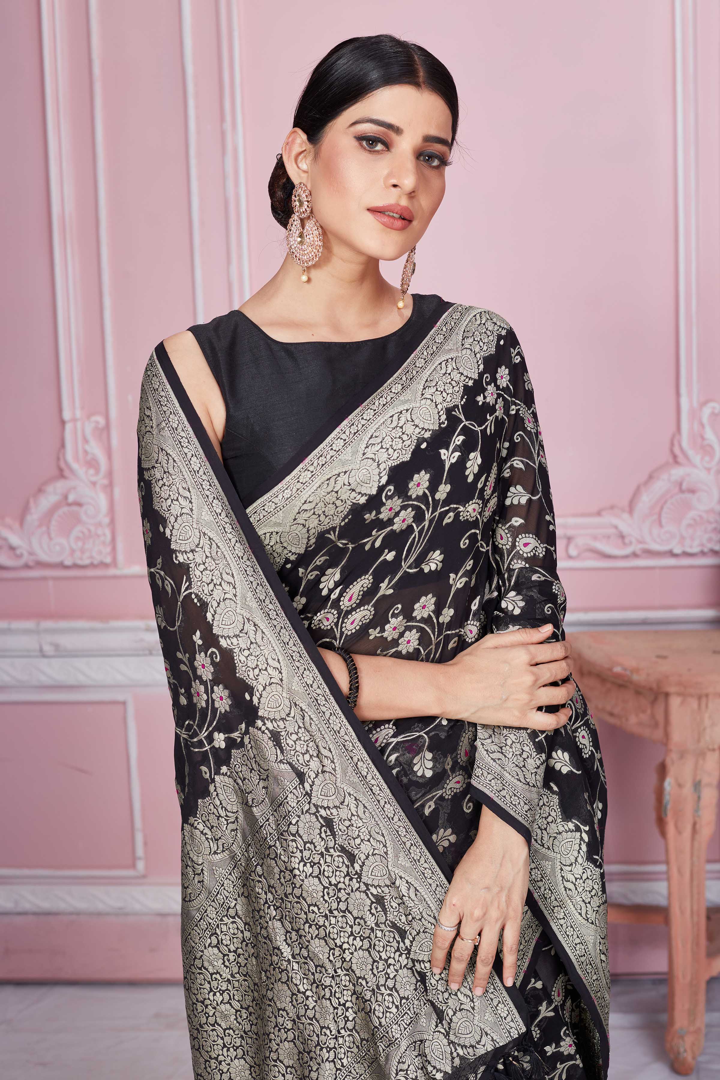 Shop black Banarasi sari online in USA with floral zari jaal. Look your best on festive occasions in latest designer sarees, pure silk saris, Kanchipuram silk sarees, handwoven sarees, tussar silk saris, embroidered sarees from Pure Elegance Indian fashion store in USA.-closeup