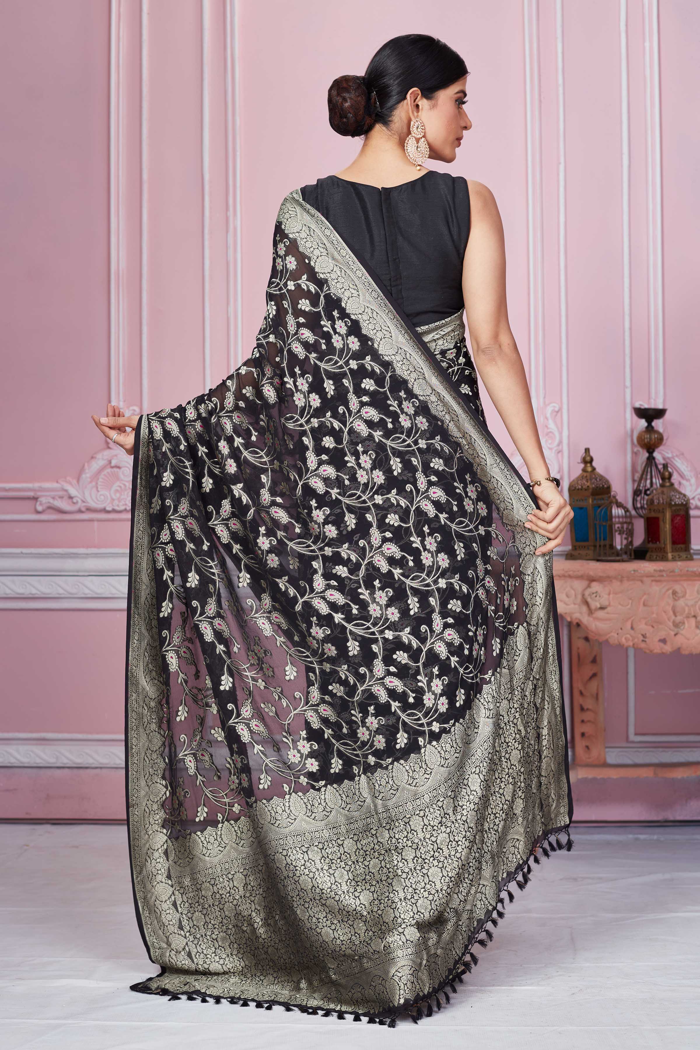 Shop black Banarasi sari online in USA with floral zari jaal. Look your best on festive occasions in latest designer sarees, pure silk saris, Kanchipuram silk sarees, handwoven sarees, tussar silk saris, embroidered sarees from Pure Elegance Indian fashion store in USA.-back