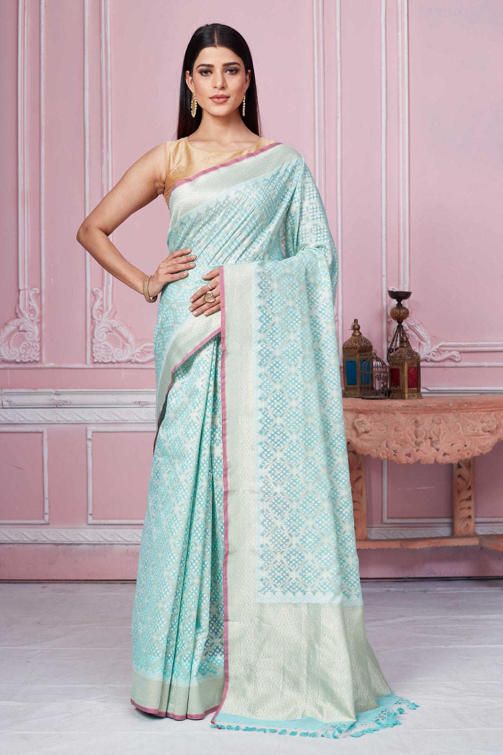 Buy pastel green Banarasi sari online in USA with overall zari work. Look your best on festive occasions in latest designer sarees, pure silk saris, Kanchipuram silk sarees, handwoven sarees, tussar silk saris, embroidered sarees from Pure Elegance Indian fashion store in USA.-full view