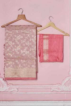 Shop powder pink Banarasi sari online in USA with floral zari jaal. Look your best on festive occasions in latest designer sarees, pure silk saris, Kanchipuram silk sarees, handwoven sarees, tussar silk saris, embroidered sarees from Pure Elegance Indian fashion store in USA.-blouse