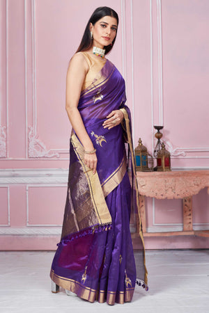 Buy purple Banarasi sari online in USA with golden zari border and zari motifs. Look your best on festive occasions in latest designer sarees, pure silk saris, Kanchipuram silk sarees, handwoven sarees, tussar silk saris, embroidered sarees from Pure Elegance Indian fashion store in USA.-side