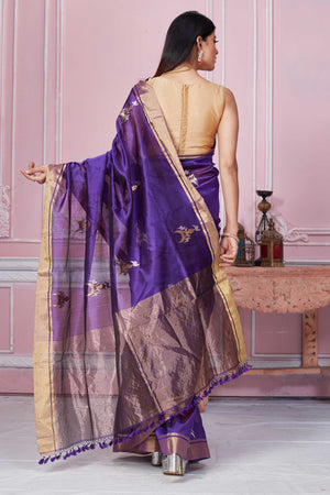 Buy purple Banarasi sari online in USA with golden zari border and zari motifs. Look your best on festive occasions in latest designer sarees, pure silk saris, Kanchipuram silk sarees, handwoven sarees, tussar silk saris, embroidered sarees from Pure Elegance Indian fashion store in USA.-back