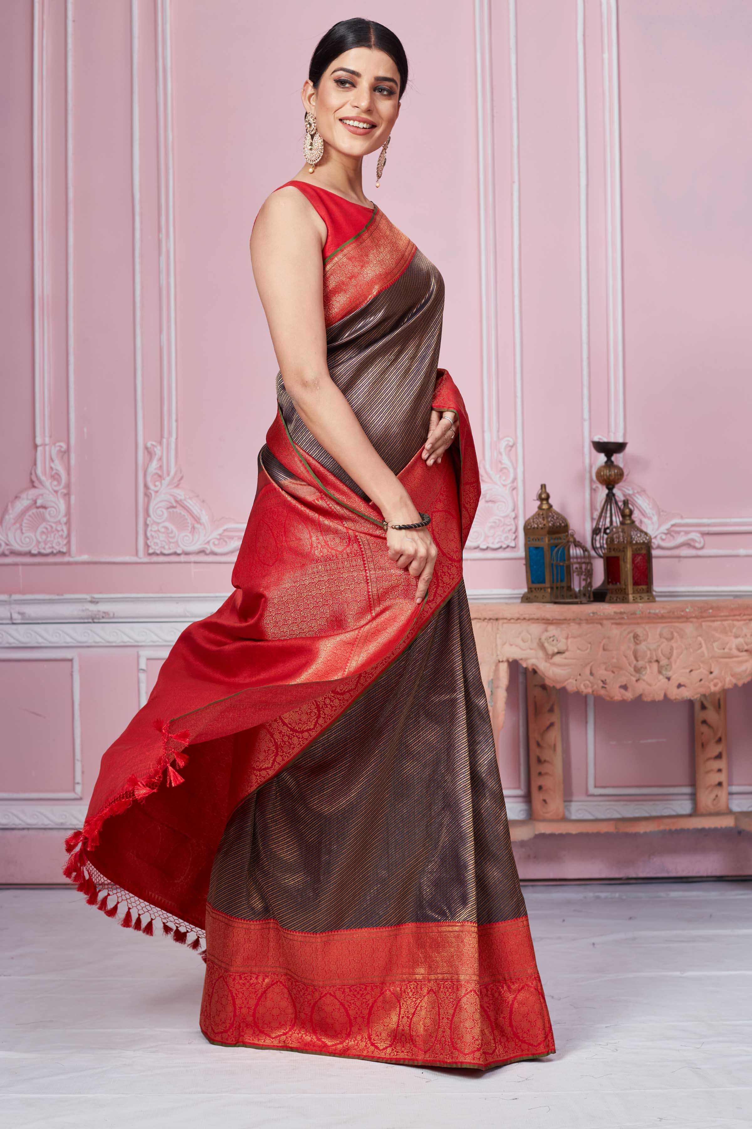 Buy brown Banarasi sari online in USA with red zari border. Look your best on festive occasions in latest designer sarees, pure silk saris, Kanchipuram silk sarees, handwoven sarees, tussar silk saris, embroidered sarees from Pure Elegance Indian fashion store in USA.-side