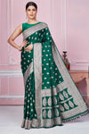 Buy dark green Banarasi sari online in USA with silver zari border. Look your best on festive occasions in latest designer sarees, pure silk saris, Kanchipuram silk sarees, handwoven sarees, tussar silk saris, embroidered sarees from Pure Elegance Indian fashion store in USA.-full view