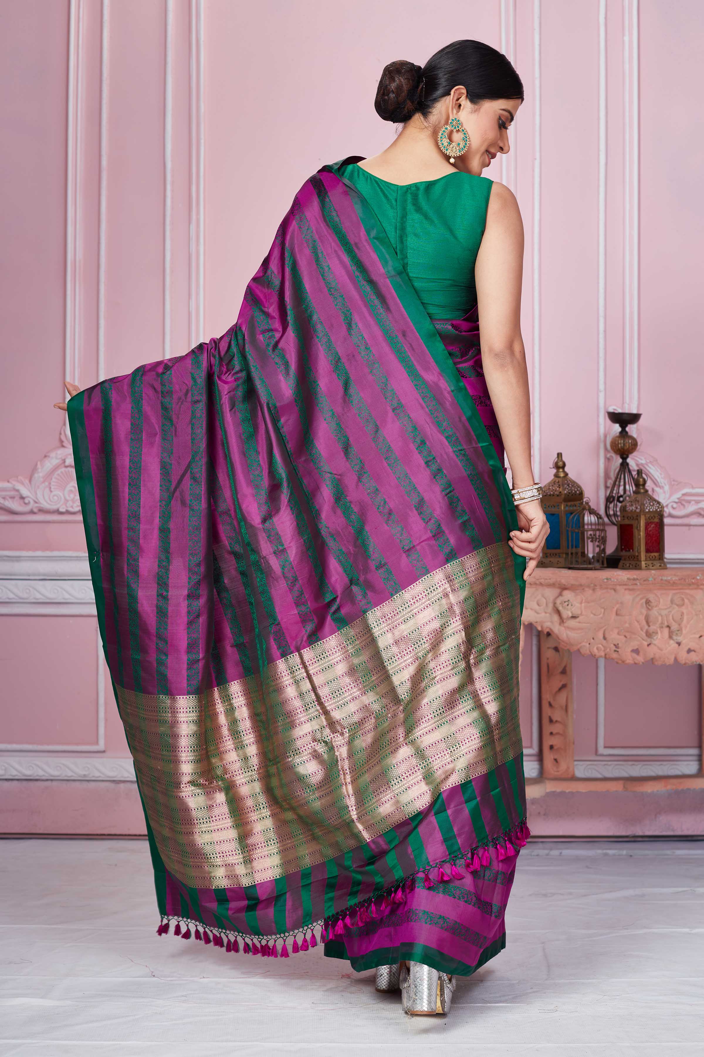 Shop purple green self stripes Banarasi sari online in USA with zari pallu. Look your best on festive occasions in latest designer sarees, pure silk saris, Kanchipuram silk sarees, handwoven sarees, tussar silk saris, embroidered sarees from Pure Elegance Indian fashion store in USA.-back
