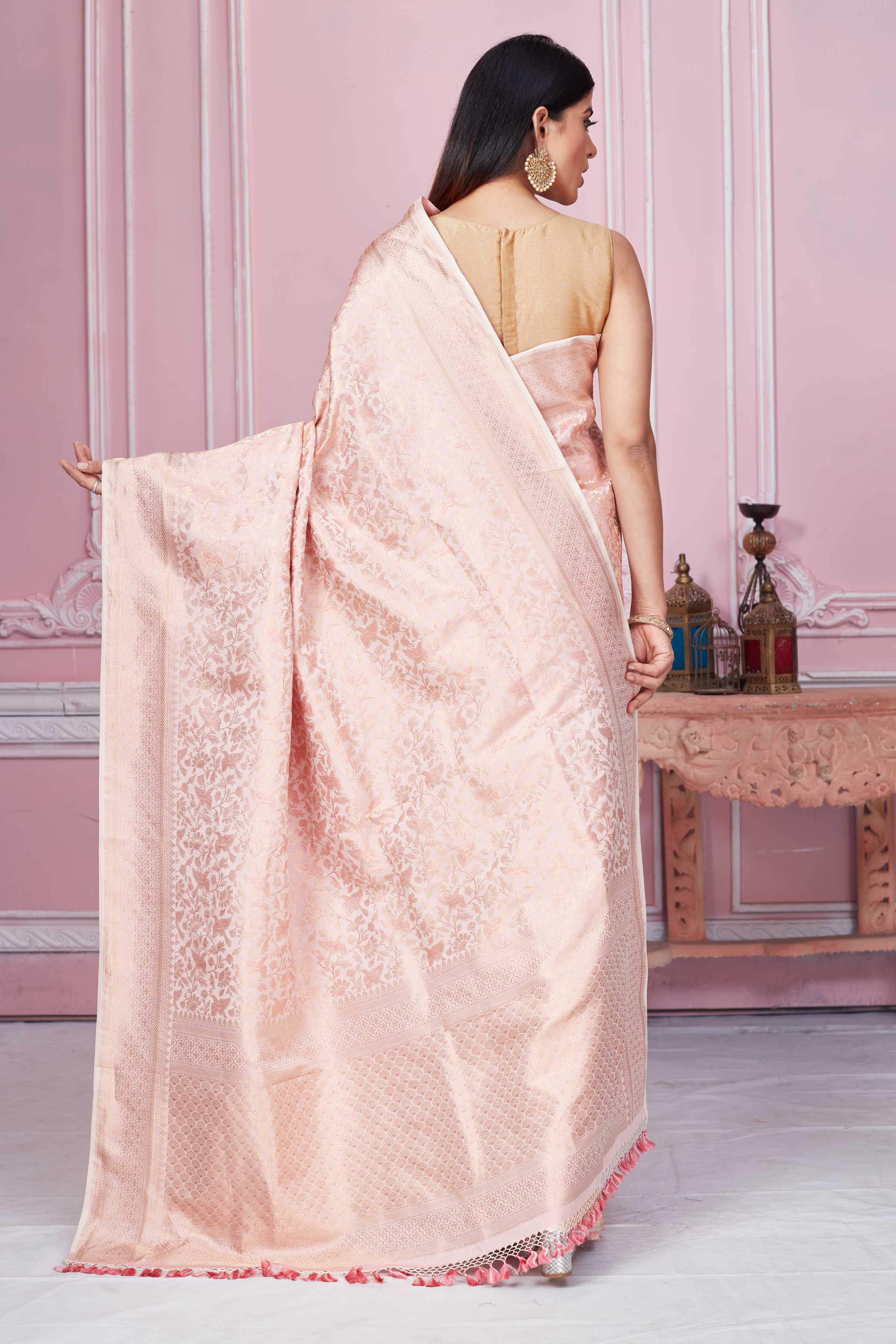 Buy powder pink Banarasi sari online in USA with overall zari jaal. Look your best on festive occasions in latest designer sarees, pure silk saris, Kanchipuram silk sarees, handwoven sarees, tussar silk saris, embroidered sarees from Pure Elegance Indian fashion store in USA.-back