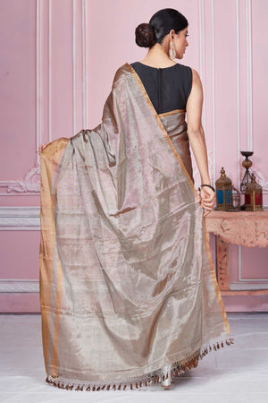 Buy metallic grey tissue Banarasi sari online in USA with golden border. Look your best on festive occasions in latest designer sarees, pure silk saris, Kanchipuram silk sarees, handwoven sarees, tussar silk saris, embroidered sarees from Pure Elegance Indian fashion store in USA.-back