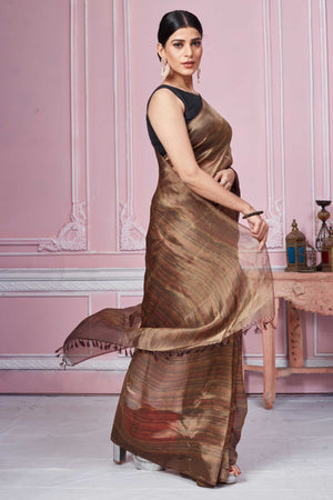 Shop stunning metallic brown tissue Banarasi sari online in USA. Look your best on festive occasions in latest designer sarees, pure silk saris, Kanchipuram silk sarees, handwoven sarees, tussar silk saris, embroidered sarees from Pure Elegance Indian fashion store in USA.-side