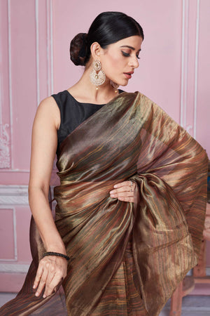 Shop stunning metallic brown tissue Banarasi sari online in USA. Look your best on festive occasions in latest designer sarees, pure silk saris, Kanchipuram silk sarees, handwoven sarees, tussar silk saris, embroidered sarees from Pure Elegance Indian fashion store in USA.-closeup