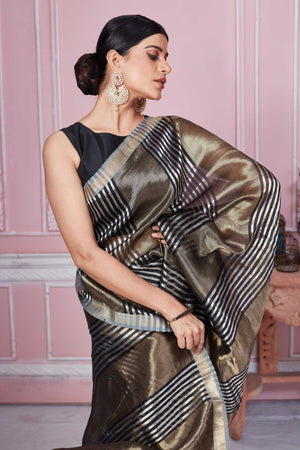 Shop beautiful antique golden and striped Banarasi saree online in USA. Look your best on festive occasions in latest designer sarees, pure silk saris, Kanchipuram silk sarees, handwoven sarees, tussar silk saris, embroidered sarees from Pure Elegance Indian fashion store in USA.-closeup