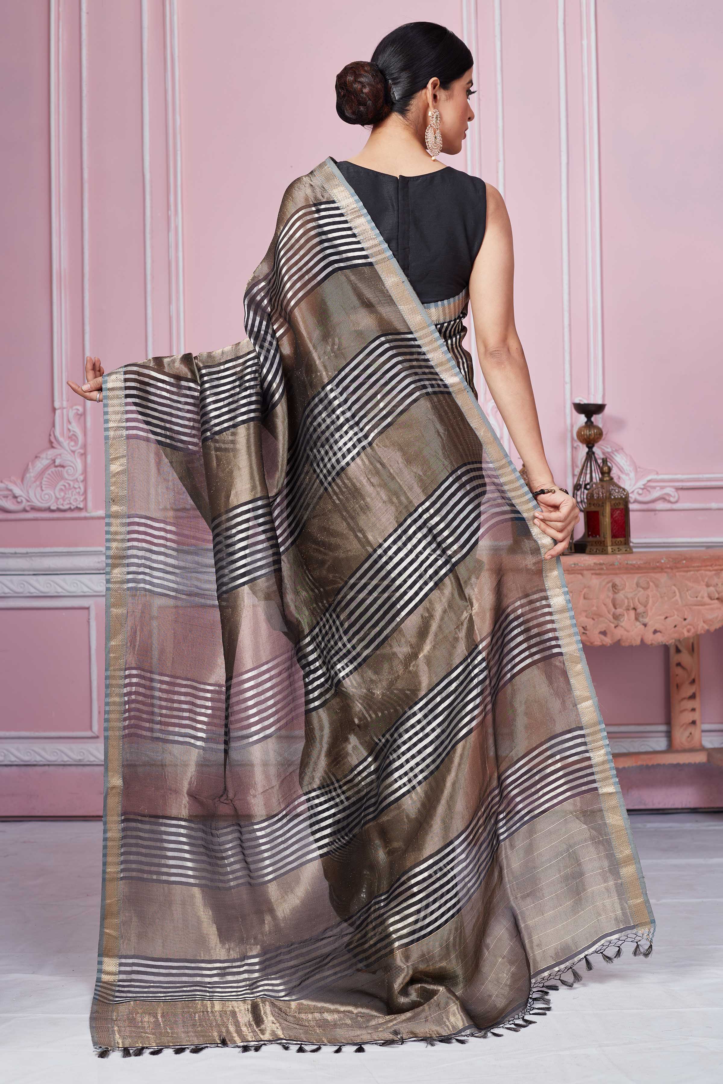 Shop beautiful antique golden and striped Banarasi saree online in USA. Look your best on festive occasions in latest designer sarees, pure silk saris, Kanchipuram silk sarees, handwoven sarees, tussar silk saris, embroidered sarees from Pure Elegance Indian fashion store in USA.-back