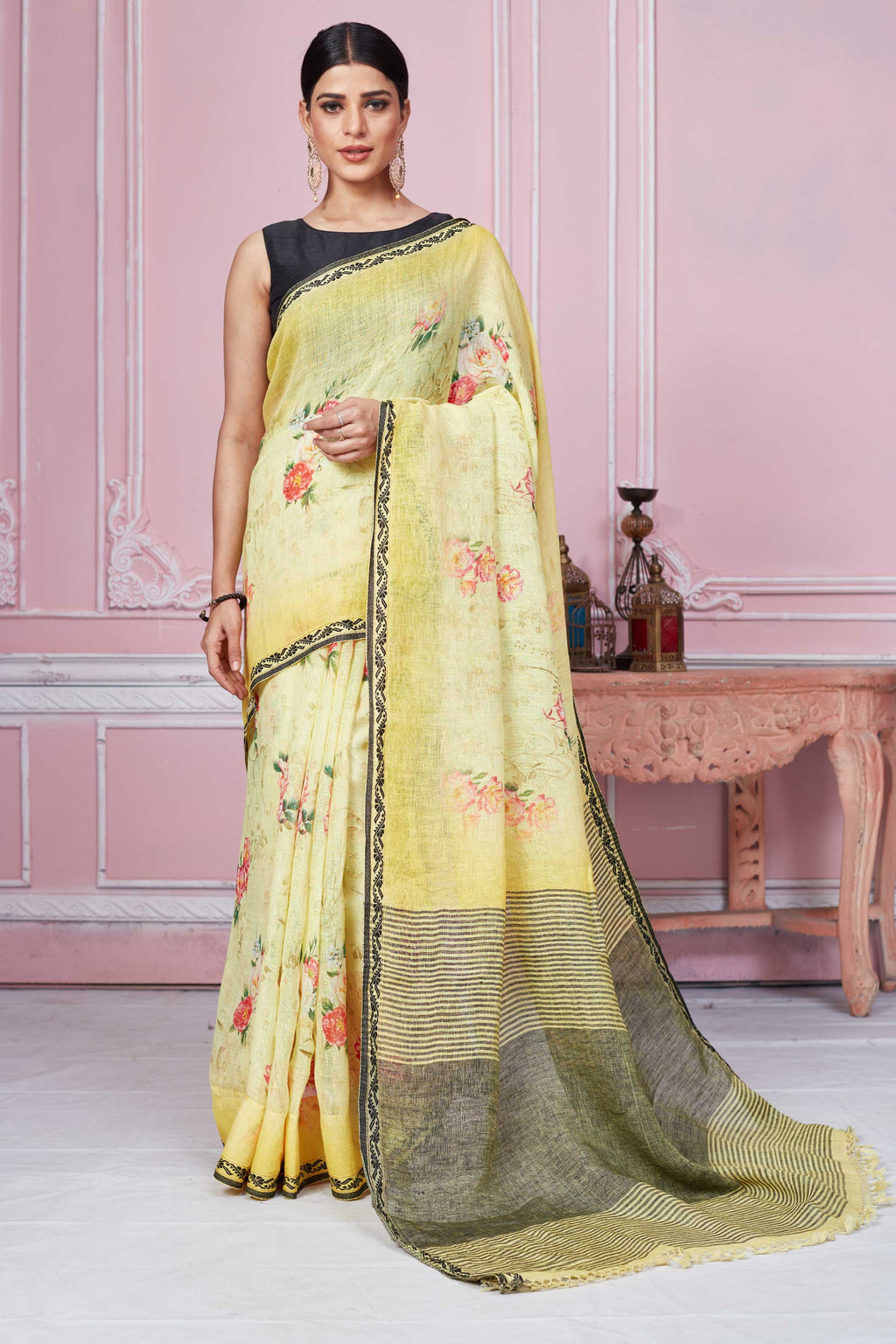 Buy yellow floral print linen saree online in USA with striped pallu. Look your best on festive occasions in latest designer sarees, pure silk saris, Kanchipuram silk sarees, handwoven sarees, tussar silk saris, embroidered sarees from Pure Elegance Indian fashion store in USA.-full view