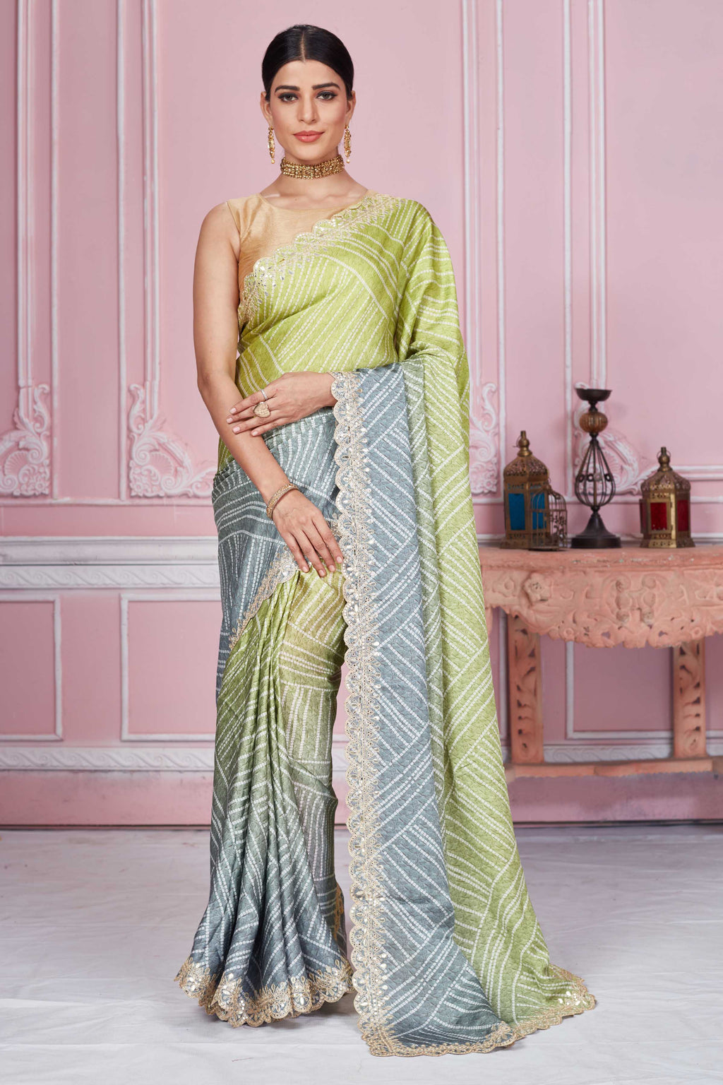 Buy green and grey crepe sari online in USA with gota work border. Look your best on festive occasions in latest designer sarees, pure silk sarees, Kanjivaram silk saris, handwoven saris, tussar silk sarees, embroidered saris from Pure Elegance Indian clothing store in USA.-full view
