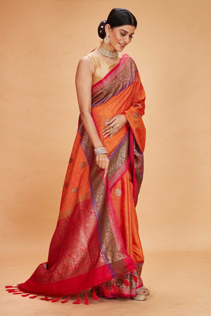 Buy orange tussar Banarasi sari online in USA with purple magenta zari border. Look your best on festive occasions in latest designer saris, pure silk sarees, Kanjivaram silk sarees, handwoven saris, tussar silk sarees, embroidered saris from Pure Elegance Indian clothing store in USA.-side