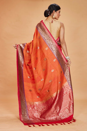 Buy orange tussar Banarasi sari online in USA with purple magenta zari border. Look your best on festive occasions in latest designer saris, pure silk sarees, Kanjivaram silk sarees, handwoven saris, tussar silk sarees, embroidered saris from Pure Elegance Indian clothing store in USA.-back