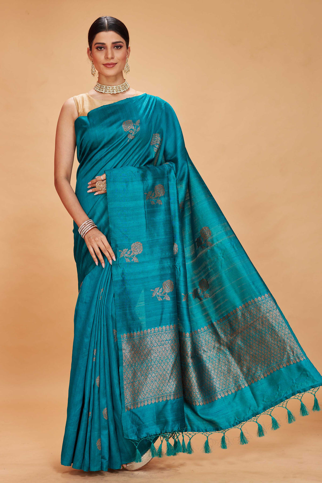 Shop sea green tussar Banarasi sari online in USA with floral zari buta. Look your best on festive occasions in latest designer saris, pure silk sarees, Kanjivaram silk sarees, handwoven saris, tussar silk sarees, embroidered saris from Pure Elegance Indian clothing store in USA.-full view
