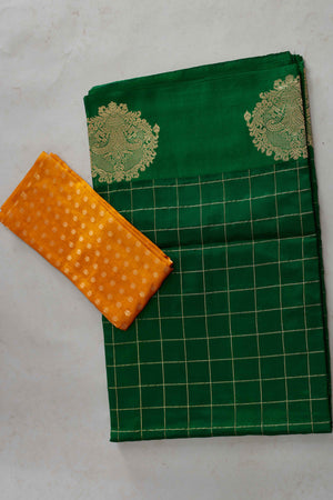 Shop bottle green check silk Banarasi sari online in USA with zari motifs border. Look your best on festive occasions in latest designer sarees, pure silk sarees, Kanjivaram silk saris, handwoven saris, tussar silk sarees, embroidered saris from Pure Elegance Indian clothing store in USA.-blouse