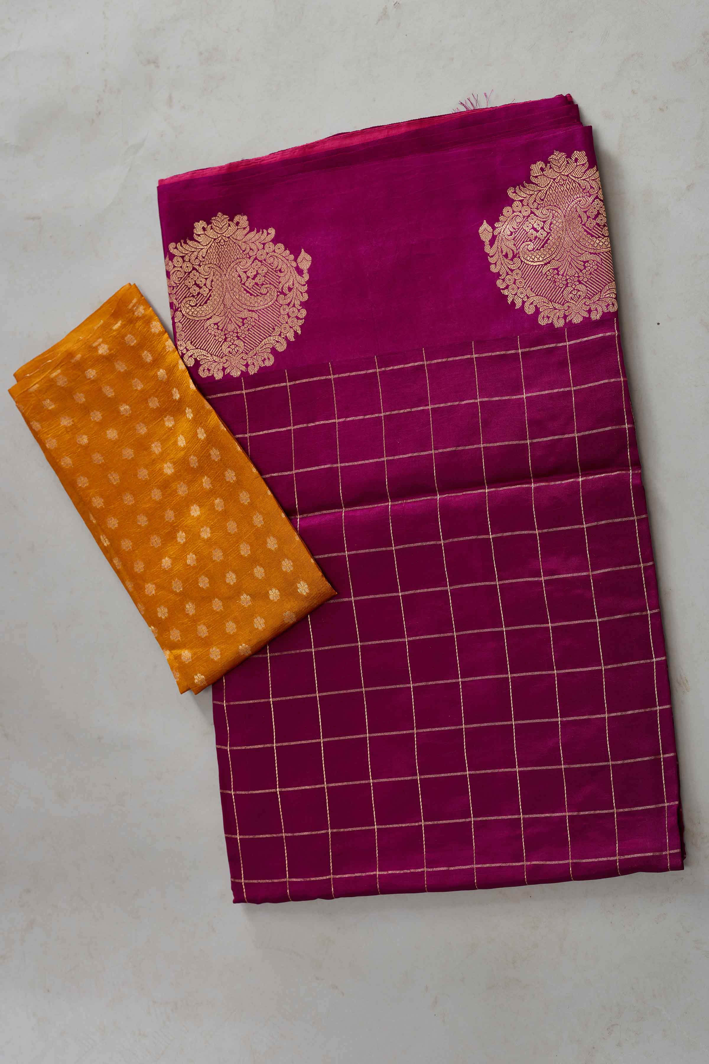 Buy magenta check silk Banarasi sari online in USA with zari motifs border. Look your best on festive occasions in latest designer sarees, pure silk sarees, Kanjivaram silk saris, handwoven saris, tussar silk sarees, embroidered saris from Pure Elegance Indian clothing store in USA.-blouse