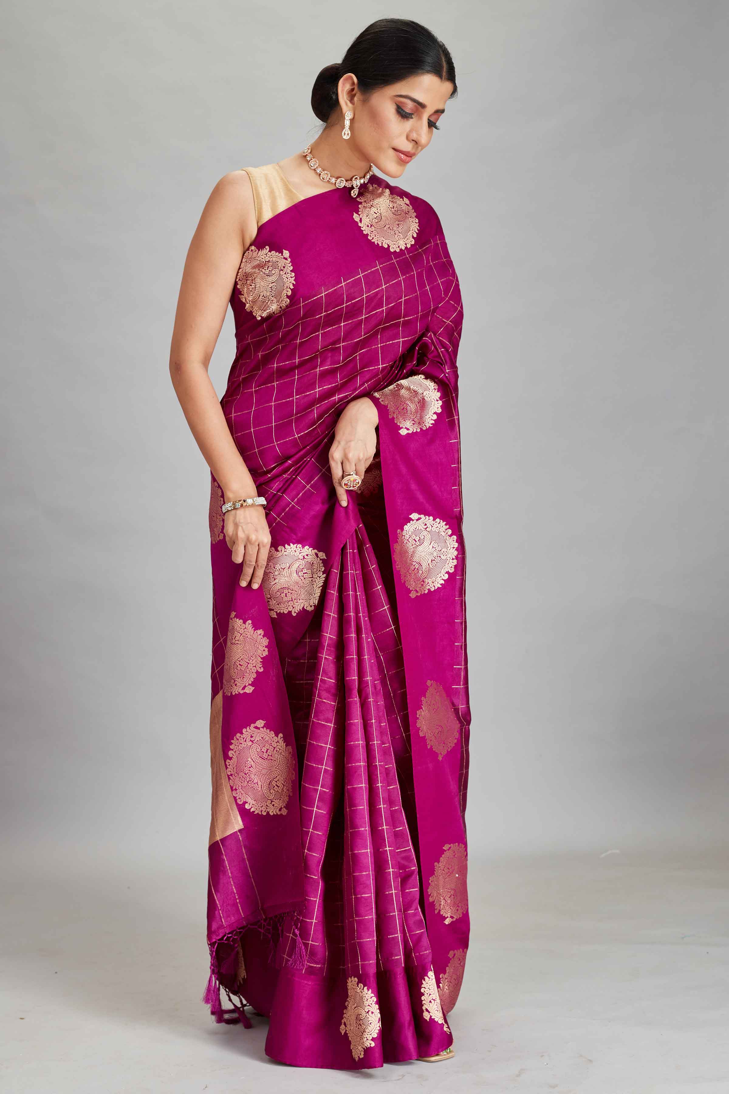 Buy magenta check silk Banarasi sari online in USA with zari motifs border. Look your best on festive occasions in latest designer sarees, pure silk sarees, Kanjivaram silk saris, handwoven saris, tussar silk sarees, embroidered saris from Pure Elegance Indian clothing store in USA.-front