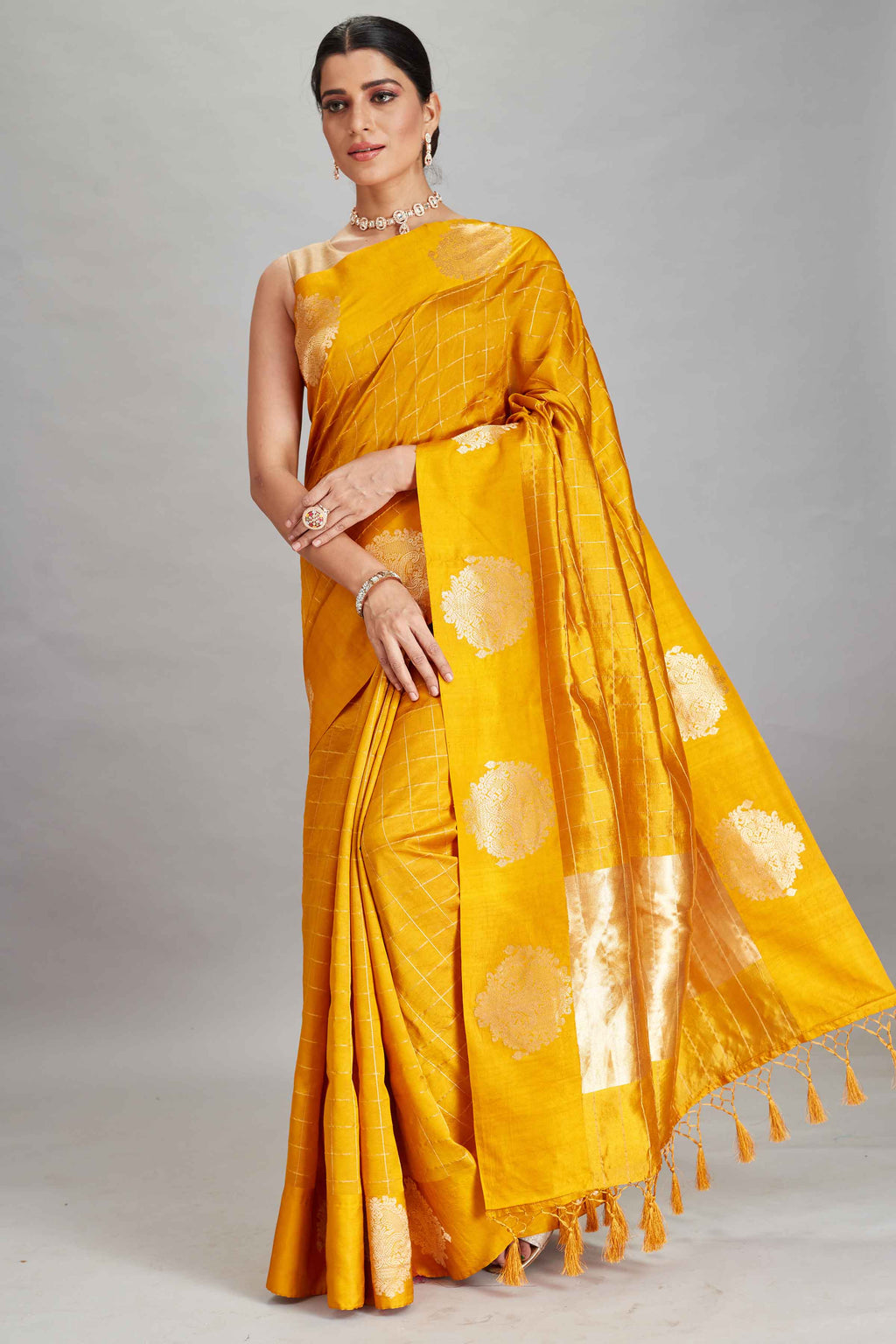 Shop yellow check silk Banarasi saree online in USA with zari motifs border. Look your best on festive occasions in latest designer sarees, pure silk sarees, Kanjivaram silk saris, handwoven saris, tussar silk sarees, embroidered saris from Pure Elegance Indian clothing store in USA.-full view