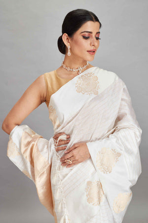 Buy white check silk Banarasi saree online in USA with zari motifs border. Look your best on festive occasions in latest designer sarees, pure silk sarees, Kanjivaram silk saris, handwoven saris, tussar silk sarees, embroidered saris from Pure Elegance Indian clothing store in USA.-closeup
