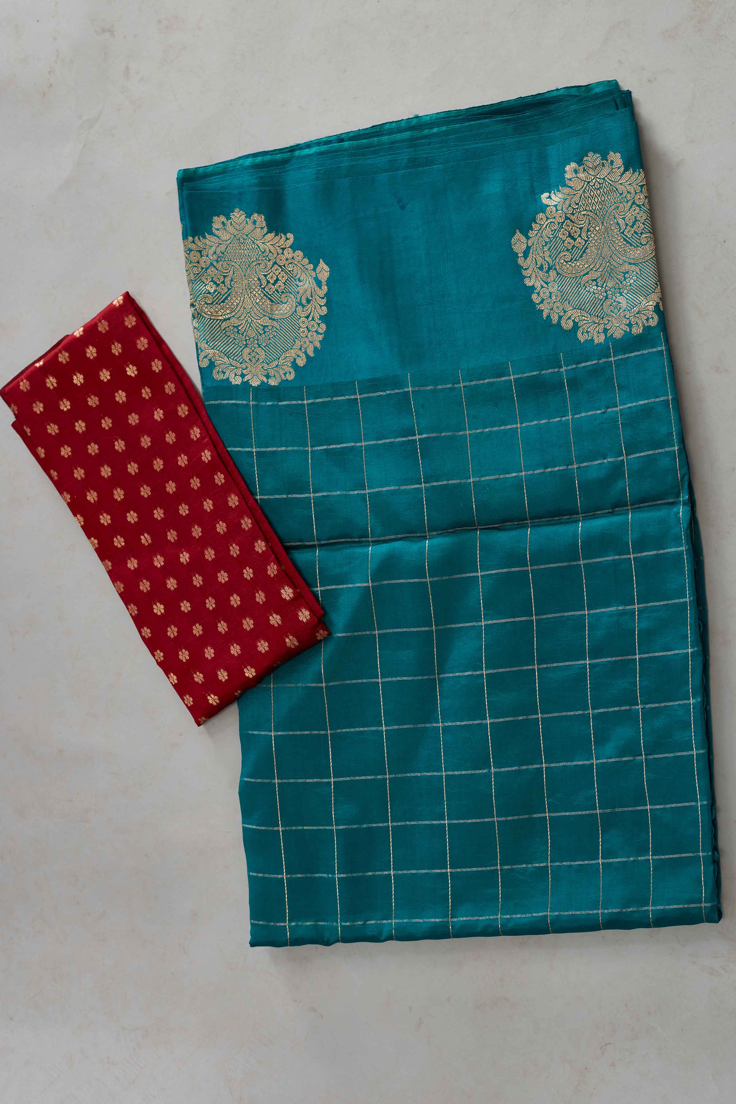 Buy beautiful sea green check silk Banarasi saree online in USA with zari motifs border. Look your best on festive occasions in latest designer sarees, pure silk sarees, Kanjivaram silk saris, handwoven saris, tussar silk sarees, embroidered saris from Pure Elegance Indian clothing store in USA.-blouse