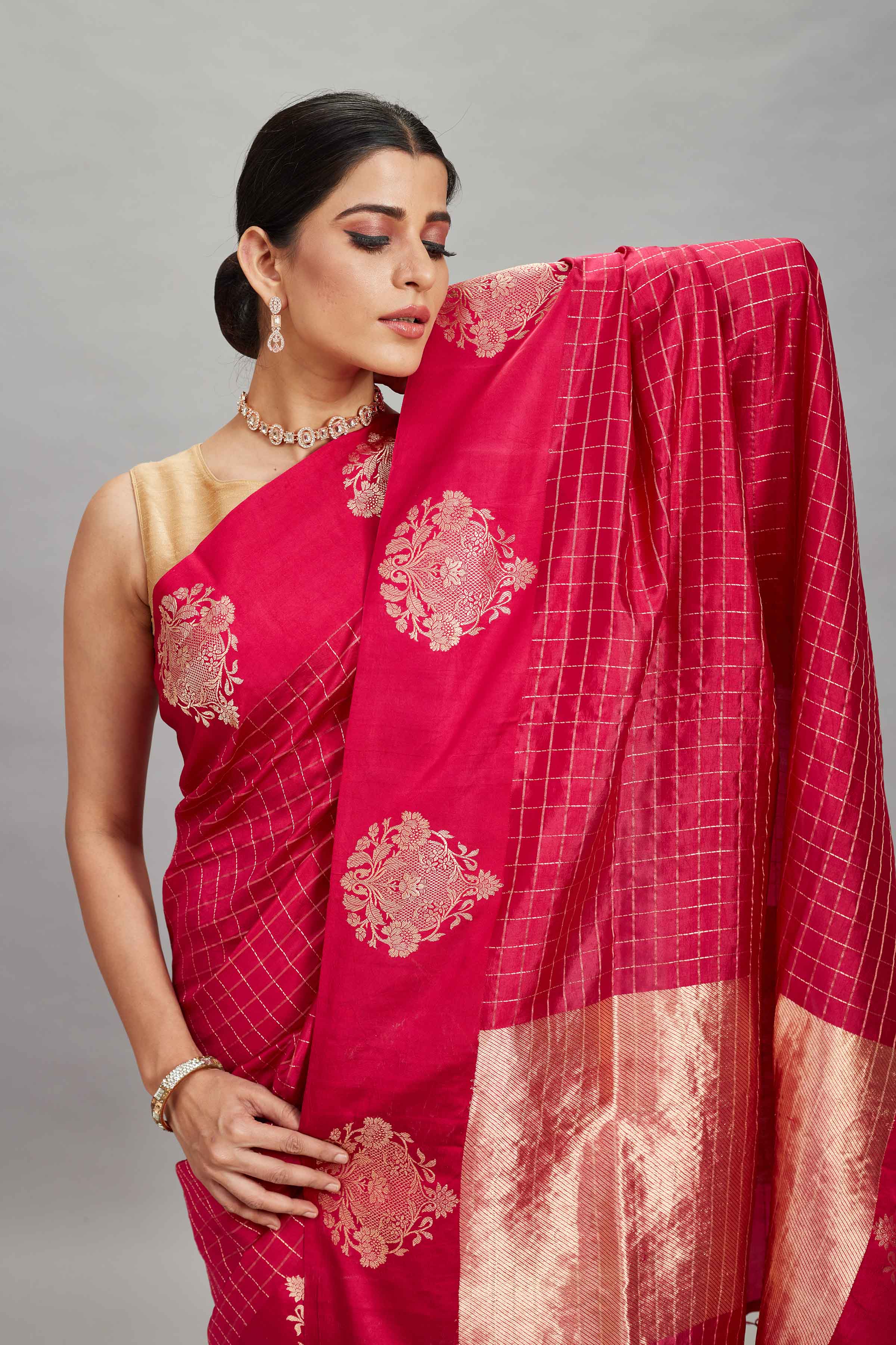 Shop red check silk Banarasi saree online in USA with zari motifs border. Look your best on festive occasions in latest designer sarees, pure silk sarees, Kanjivaram silk saris, handwoven saris, tussar silk sarees, embroidered saris from Pure Elegance Indian clothing store in USA.-closeup
