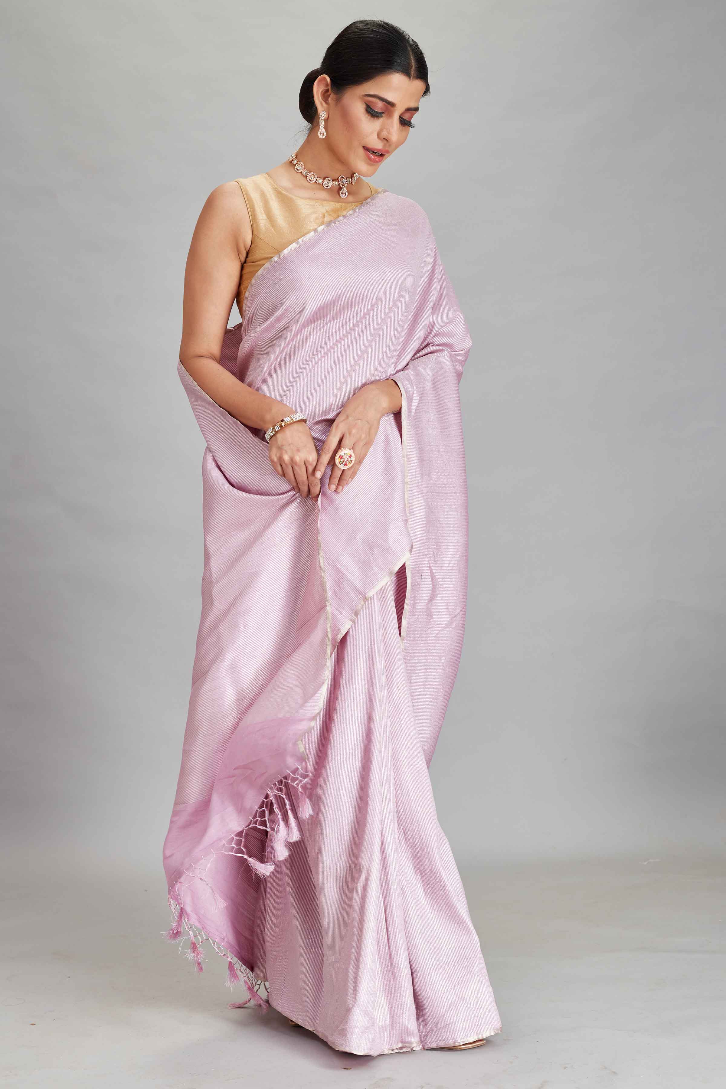 Shop lilac muga Banarasi saree online in USA with zari stripes. Look your best on festive occasions in latest designer sarees, pure silk sarees, Kanjivaram silk saris, handwoven saris, tussar silk sarees, embroidered saris from Pure Elegance Indian clothing store in USA.-side