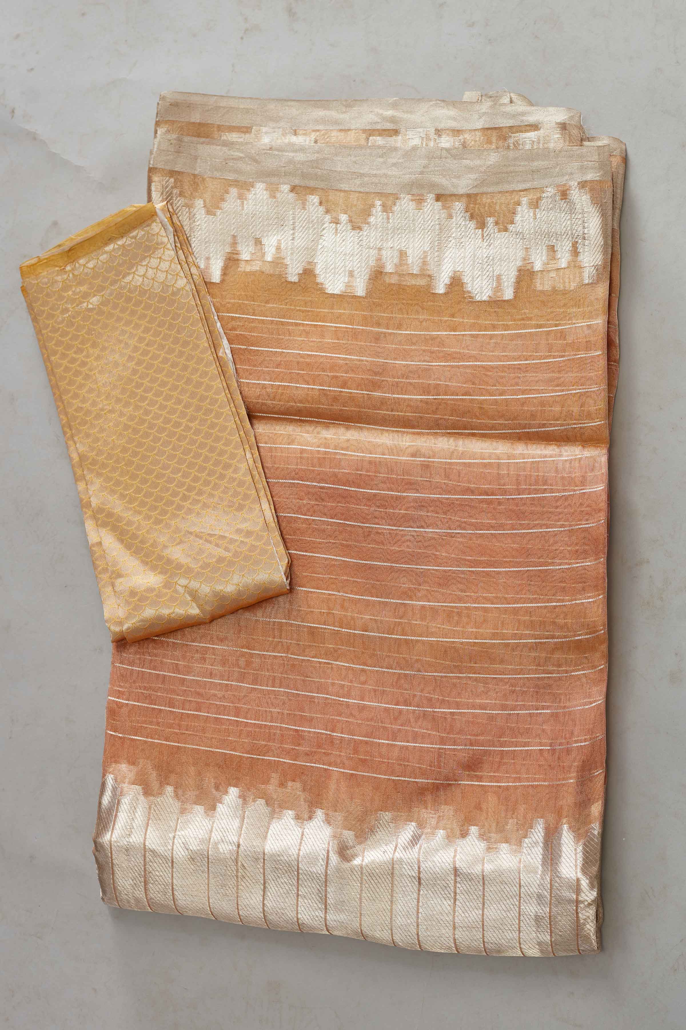 Shop peach and silver striped tissue Banarasi saree online in USA. Look your best on festive occasions in latest designer sarees, pure silk sarees, Kanjivaram silk saris, handwoven saris, tussar silk sarees, embroidered saris from Pure Elegance Indian clothing store in USA.-blouse