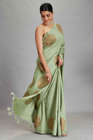 Buy sage green Muga silk Banarasi sari online in USA with big zari motifs. Look your best on festive occasions in latest designer sarees, pure silk sarees, Kanjivaram silk saris, handwoven saris, tussar silk sarees, embroidered saris from Pure Elegance Indian clothing store in USA.-side